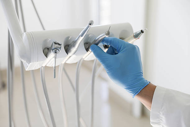 Professional Tooth Extraction technician working in Tysons, VA